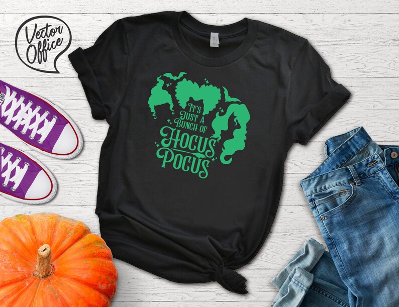May include: Black t-shirt with a green graphic of the Sanderson sisters from the movie Hocus Pocus. The text reads "It's just a bunch of Hocus Pocus".