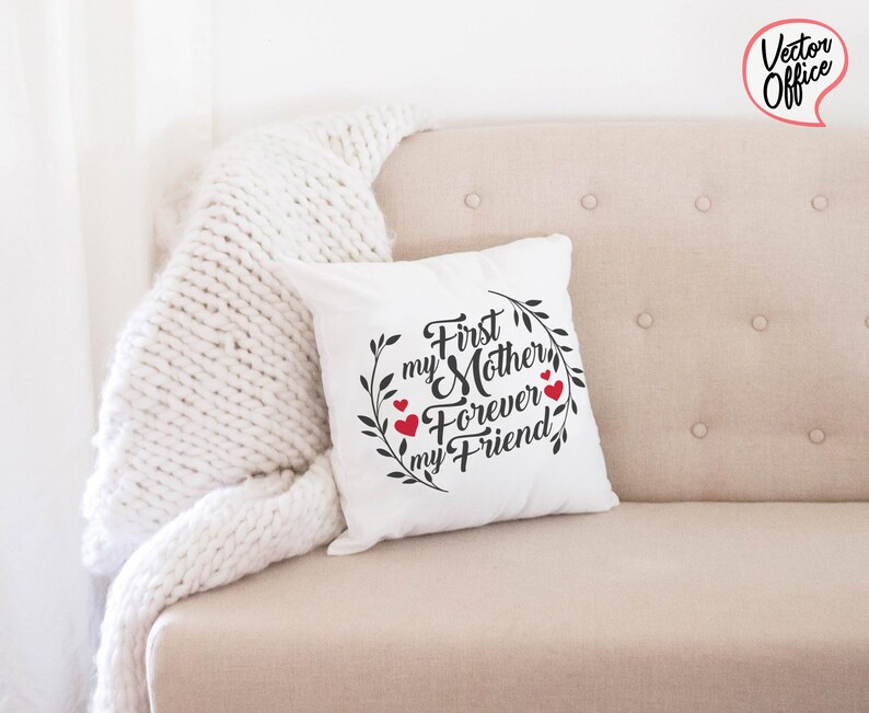 May include: White throw pillow with black text that reads "First my Mother Forever my Friend" with a wreath of leaves and red hearts around the text.