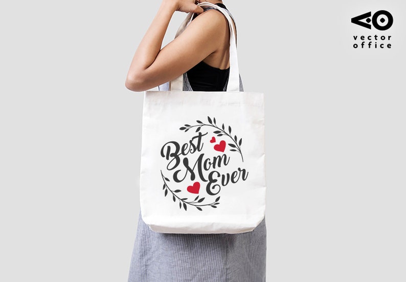 May include: White tote bag with black text and red hearts that reads "Best Mom Ever" surrounded by a wreath of leaves.