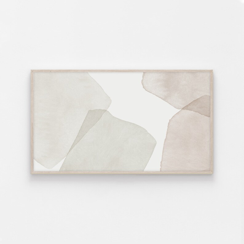 Op de afbeelding: Abstracte kunstprint met een witte achtergrond en overlappende vormen in tinten lichtbruin en groen. De print is ingelijst in een licht houten lijst.