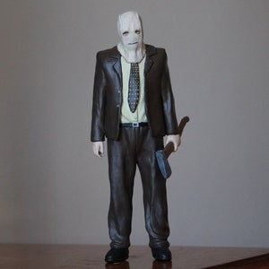 Der Fremde Mann in der Maske Figur