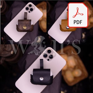 May include: Three different leather cases for Airpods, each with a different color and design. The cases are shown on top of white iPhones. The cases have a strap for easy carrying.