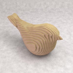 May include: A wooden bird sculpture with a layered design. The bird is light brown and has a rounded body, a small beak, and a slightly raised tail. The sculpture is made of multiple horizontal layers of wood.