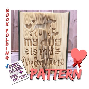 May include: A book folding pattern with the text "My Dog is My Valentine" and a dog silhouette cut into the pages. The word "Pattern" is in pink. Includes a free tutorial and pattern.