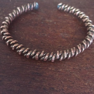 Bracelet Double torsion Anneaux Tensor 111hz