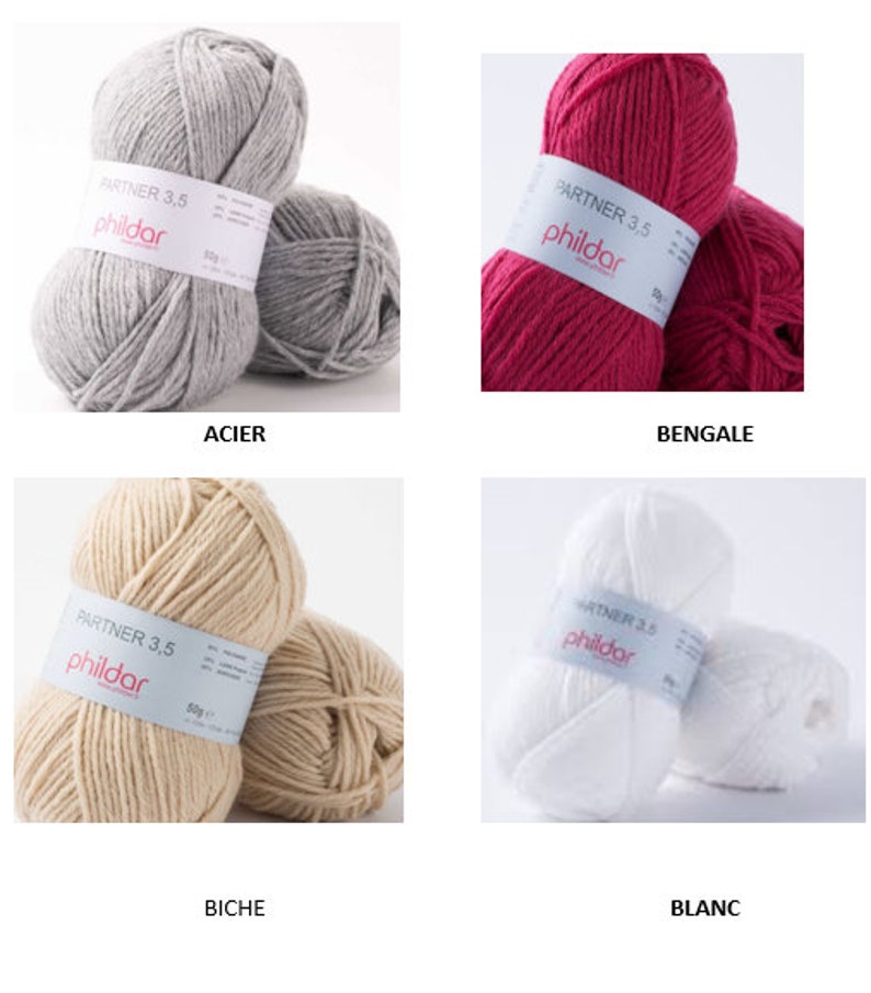 Peut inclure: Quatre pelotes de laine de diff&eacute;rentes couleurs : gris, rose, beige et blanc. Chaque pelote porte une &eacute;tiquette "PARTNER 3.5 phildar".
