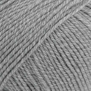 May include: A skein of light gray yarn.