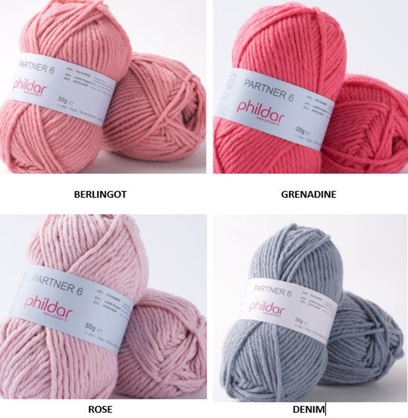 May include: Four skeins of yarn in different colors: pink, coral, light pink, and gray. Each skein has a label that says "Partner 6" and "Phildar".