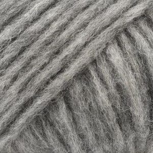 May include: A close-up view of light gray yarn featuring a multi-ply twisted construction. The fibers appear soft and slightly fuzzy with a consistent matte texture throughout the strands, showing the diagonal orientation of the spun wool yarn.
