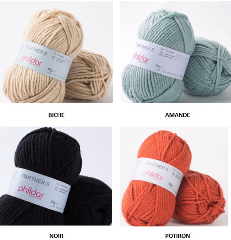 May include: Four balls of yarn in different colors: beige, light blue, black, and orange. Each ball has a label that says "Partner 6" and "Phildar" with a weight of 50g.