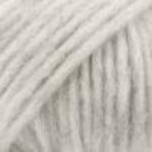 May include: A close-up view of light gray yarn, showing the twisted fiber strands arranged in parallel lines. The texture is soft and fibrous, with a consistent neutral color throughout the entire surface of the material, highlighting the individual plies.