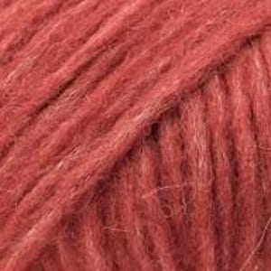 May include: A close-up view of a skein of yarn in a deep, muted terracotta red color. The texture is fuzzy and fibrous, showing the twisted strands of the yarn running diagonally across the frame, highlighting the soft, matte finish of the material.