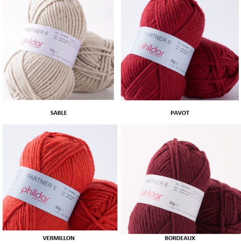 May include: Four skeins of yarn in different colors: beige, red, orange, and burgundy. Each skein has a label that says "Partner 6" and "Phildar" with a weight of 50 grams.