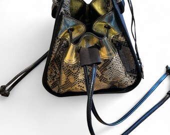Unique Compact Fully Lined  Leather  Hammock Style Bags.