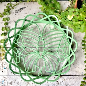 Butterfly trivet or stand; sea-foam green enameled metal