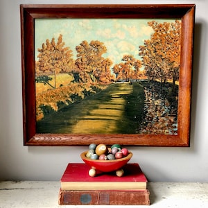 Vintage amateur oil painting of an autumn landscape