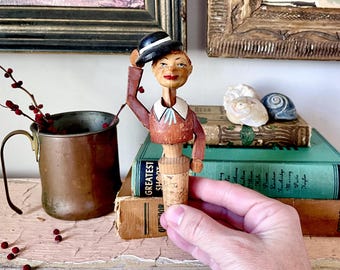 Vintage wooden bobble-head wine cork