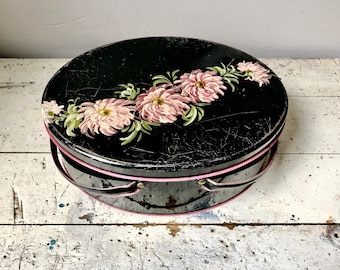 Vintage oval floral tin with handles