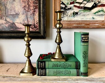 Antique brass candlestick holders, made in England; 10" tall