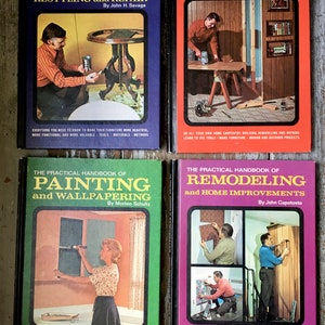 May include: Four vintage paperback books with colorful covers and titles related to home improvement. The books are "The Practical Handbook of Furniture Refinishing, Restyling and Repair", "The Practical Handbook of Carpentry", "The Practical Handbook of Painting and Wallpapering", and "The Practical Handbook of Remodeling and Home Improvements".