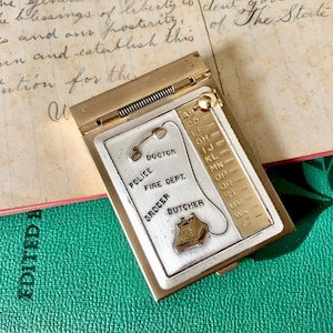 Vintage miniature gold-tone address book