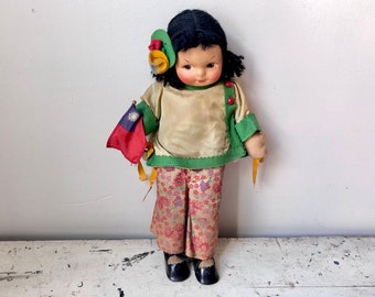 Vintage Taiwanese National doll with cloth body