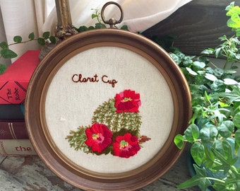 Crewel embroidery of a claret cup cactus; Spinnerin Stitchery