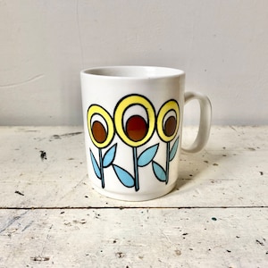 Vintage retro flower-power ceramic mug