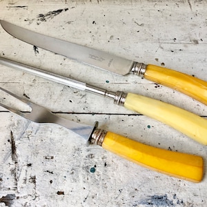 Vintage Washington Forge carving set; Stainless steel and Bakelite