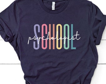 May include: A navy blue t-shirt with the text "School Psychologist" in rainbow colors.