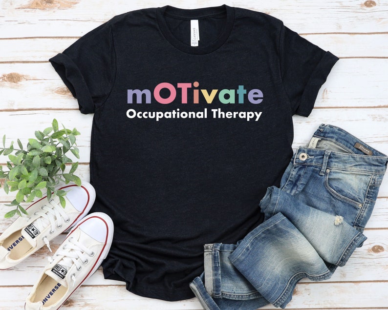 May include: A black t-shirt with the text "motivate Occupational Therapy" in rainbow colours.