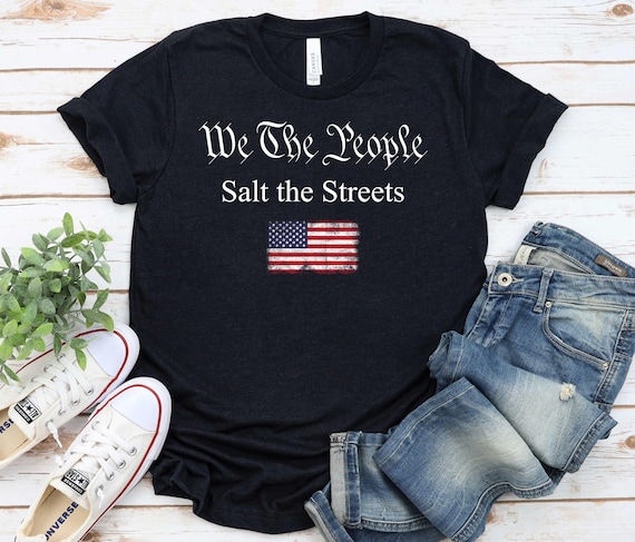 Minneapolis Activist Tee, We Are The People Salt the Streets, Slipping on Ice Graphic T-Shirt / GBD2617