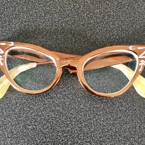 Vintage 1950s woman’s metallic brown aluminium cats eye glasses spectacles engraved and painted