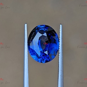 A natural, elegant heat treated Earth-mined Ceylon royal blue sapphire cut into a oval shape.