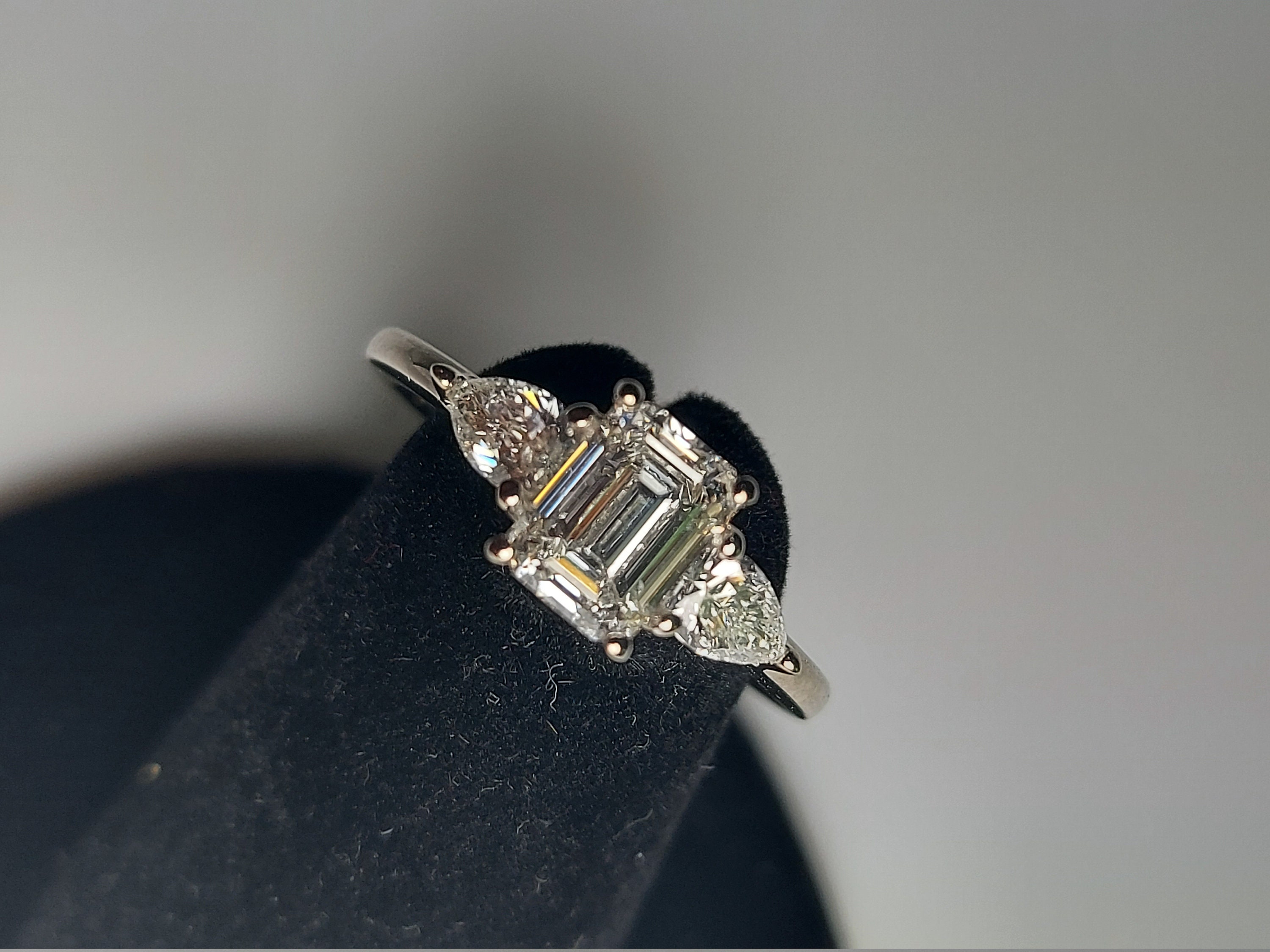 Angel Trilogy Palladium 1.00ct Three Stone Emerald Cut Diamond Ring -  Diamonds from Faith Jewellers UK