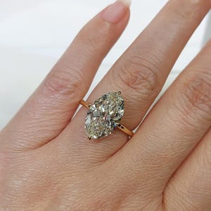 5 Carat Oval Lab Grown Diamond Engagement Ring: 14k Gold, H VS1, IGI Certified