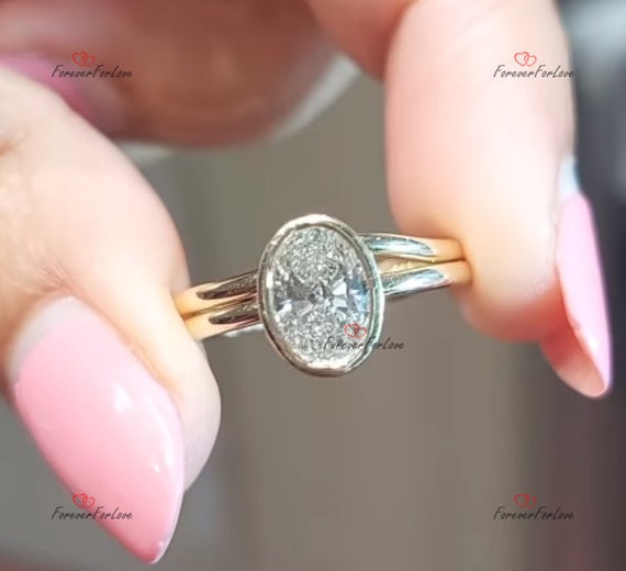 Oval diamond shop bezel set ring