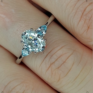 Vintage Unique Oval Moissanite engagement ring Blue Topaz White gold engagement ring women Pear Cut diamond wedding Bridal Promise ring.