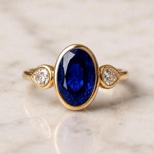 14k Oval Blue Sapphire lab Gemstone Ring, Bezel Set Engagement Ring, Minimalist Gold Ring with Side Pear Diamonds, Modern Statement Ring