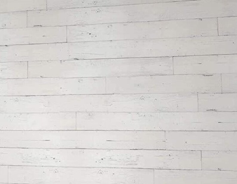 May include: Whitewashed wood paneling with a rustic, distressed look. The wood planks are arranged horizontally, creating a clean and modern aesthetic.