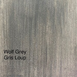 May include: Close-up of a textured surface in a wolf grey color. The surface has vertical lines and the words "Wolf Grey" and "Gris Loup" are printed on the surface.