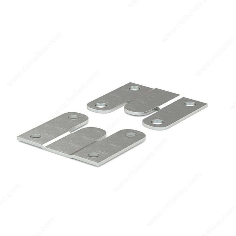 May include: A set of silver-colored metal furniture connector plates. Each plate has a rectangular shape with rounded corners and pre-drilled holes for screws. The plates are designed to connect furniture components.