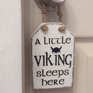 Nursery Vikings Sign hanging on door