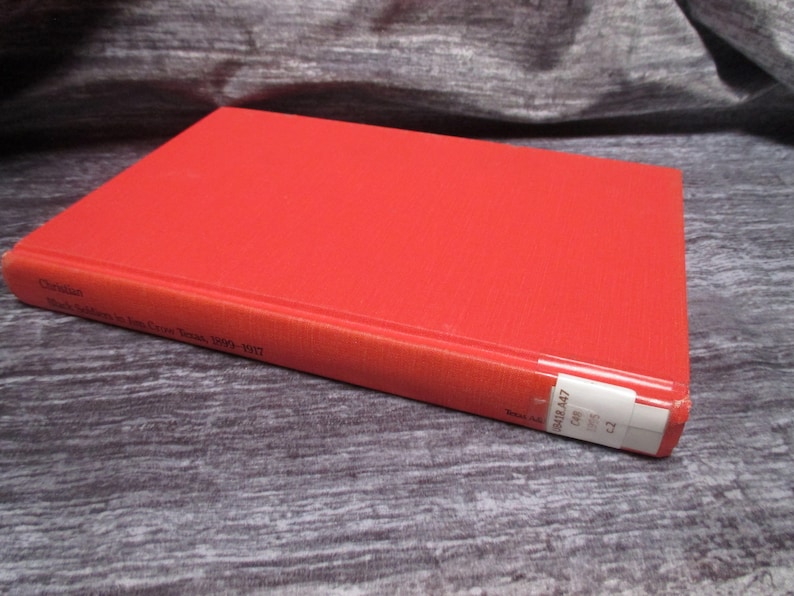 May include: Red hardcover book with the title "Red Soldiers in the Iron Cross Years, 1914-1917" on the spine. The book has a white label on the bottom edge with the number "9418.447".