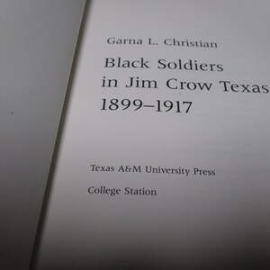 May include: Book cover with the title "Black Soldiers in Jim Crow Texas, 1899-1917" by Garna L. Christian. Published by Texas A&M University Press, College Station.