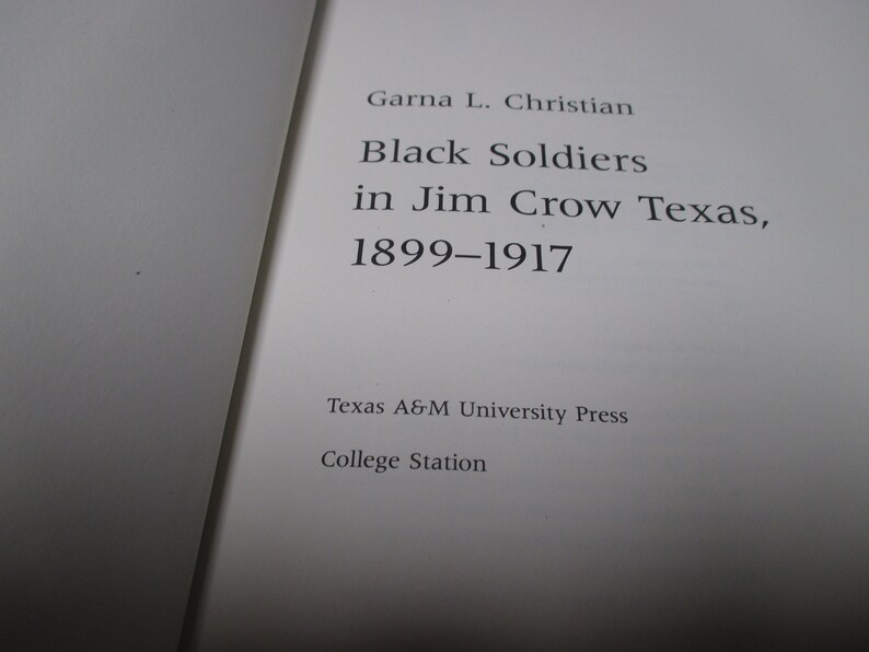 May include: Book cover with the title "Black Soldiers in Jim Crow Texas, 1899-1917" by Garna L. Christian. Published by Texas A&M University Press, College Station.