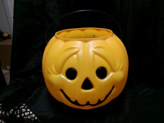 Vintage 1990s 9" tall General foam round eyes blow mold pumpkin
