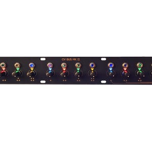 May include: A black ZORX Electronics CV Bus Pro II module with 16 knobs and 16 jacks. Each knob has a coloured LED light that illuminates in a different colour.