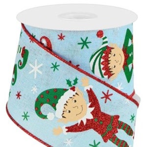 May include: A spool of light blue Christmas ribbon with a repeating pattern of elves, snowflakes, and stars. The elves wear red and green outfits with white hats. The ribbon's edges are trimmed with red glitter.