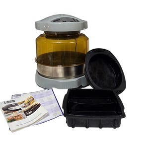 May include: A NuWave oven with a gray top and a transparent amber-colored cooking chamber. Includes black cooking trays and a recipe booklet. The oven is designed for countertop cooking.